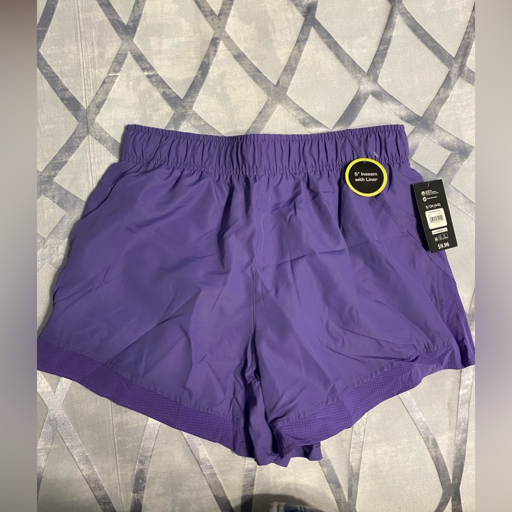 Size small, purple running shorts